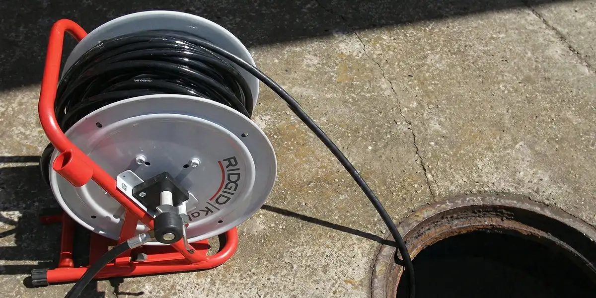 sewer rodding equipment prepared to clear clogged sewer lines in Boca Raton, FL