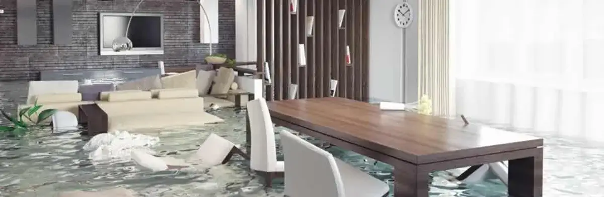 home interior affected by water damage with flooded floors and displaced furniture in Boca Raton, FL